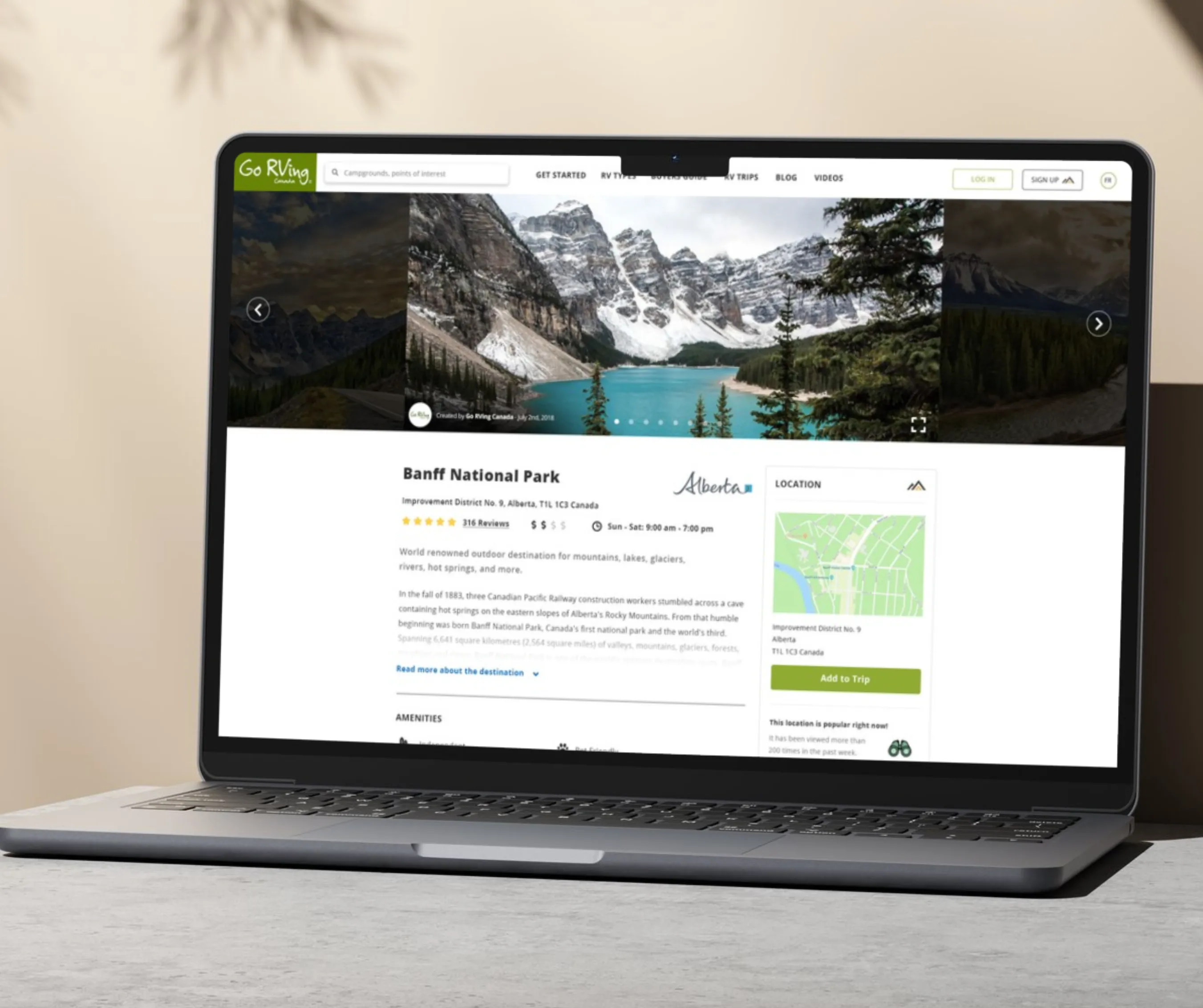 Banff National Park destination screen with scenic mountain-lake photos, reviews, description and a location map
