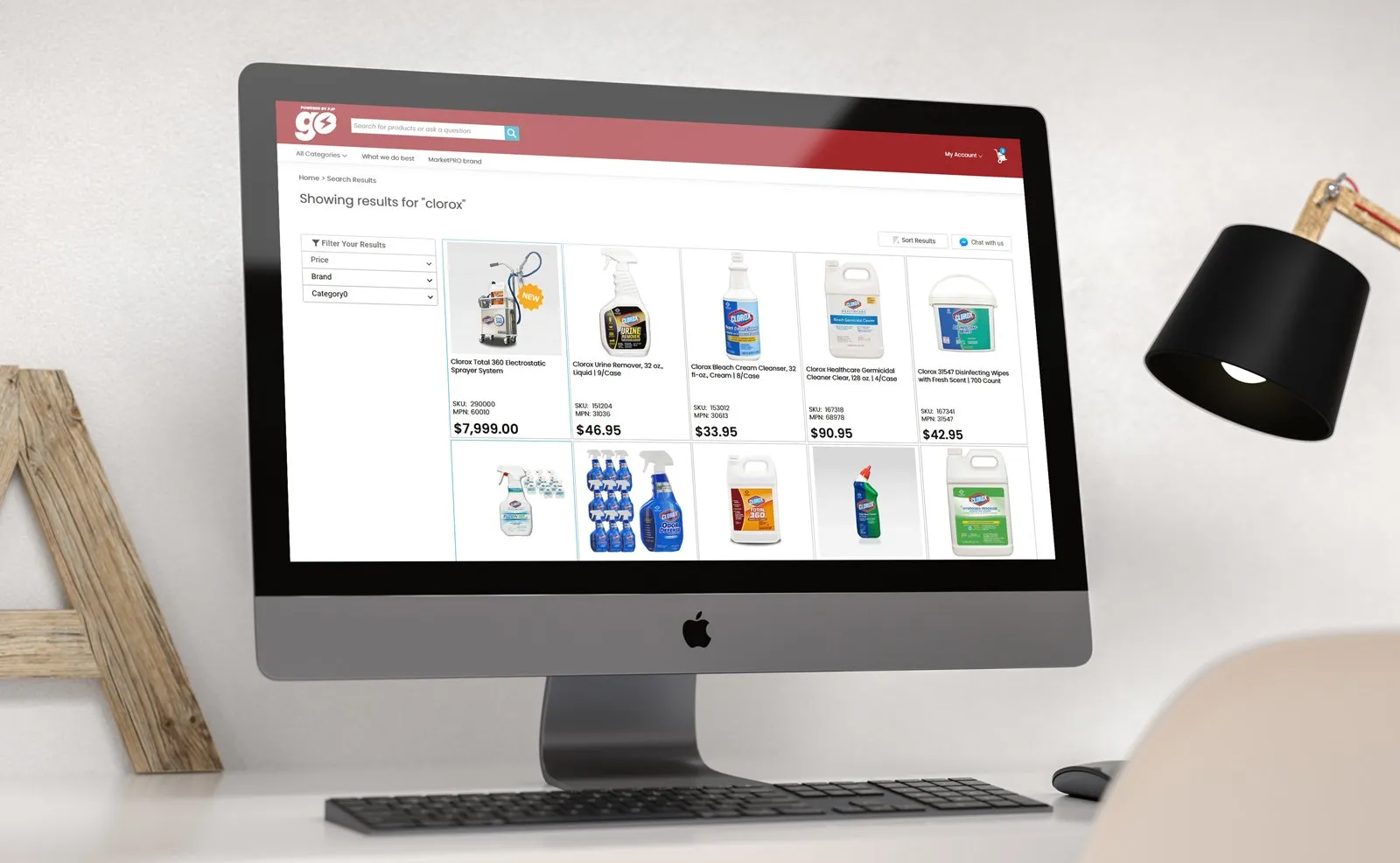 iMac showing PJP Go search results for clorox with a grid of cleaning-product cards, SKUs and prices