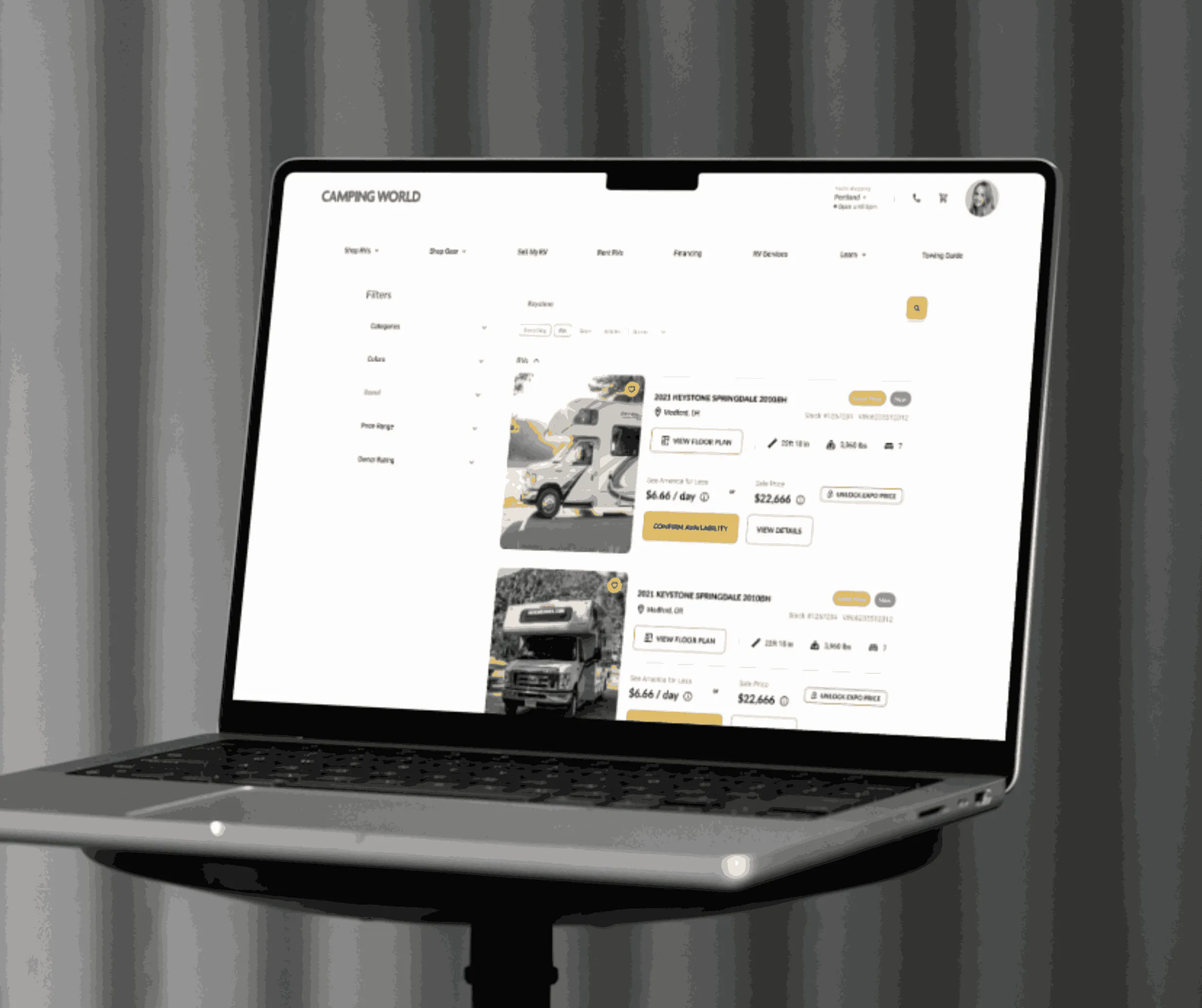 Laptop mockup of Camping World RV listings search page with filters and Keystone Springdale travel trailer results