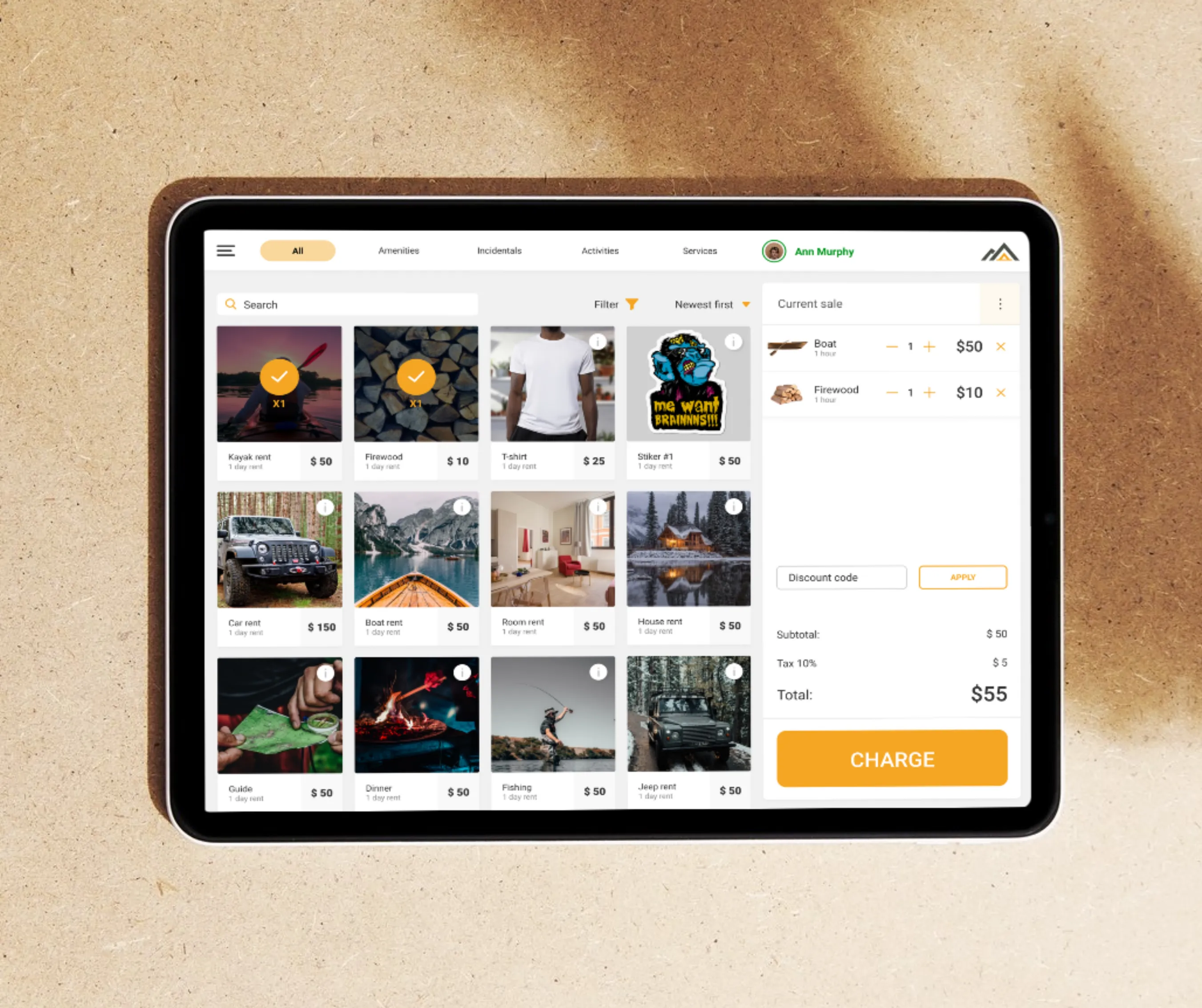 Tablet POS screen showing a grid of campground rental products with prices and a current-sale cart totaling $55